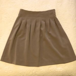 H&M size 8 skirt. Mid brown colour with purple undertone.